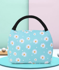 Sac Isotherme Repas Marguerite sur une table