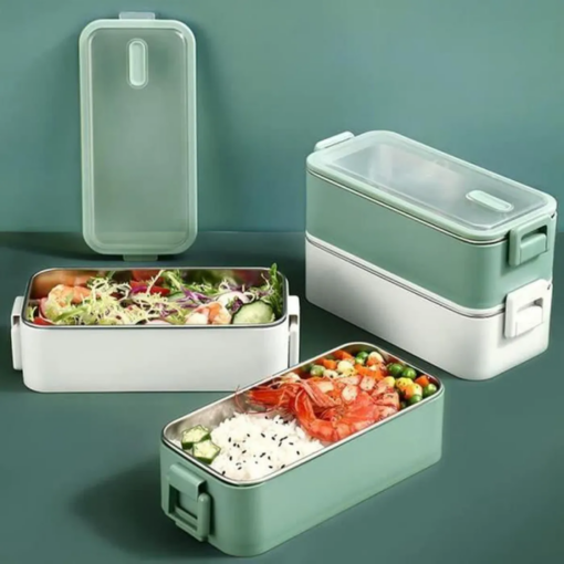 la Lunch Box Inox Verte et Blanche avec de la nourritures