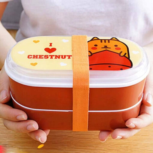 une personne avec la Lunch Box Bento Orange