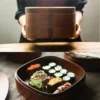 une personne utilisant la Boîte Bento LunchWise