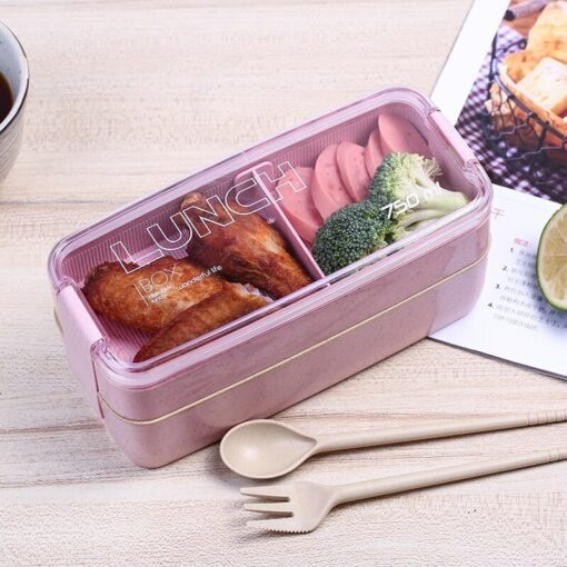 la La conception multi-compartiments de cette Lunch Box Rose 2 étages vous permettra de transporter une plus grande variété d'aliments pour vos pauses déjeuner. avec de la nourritures