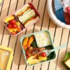 la Boîte à Lunch Travel Bento avec de la nourriture dedans